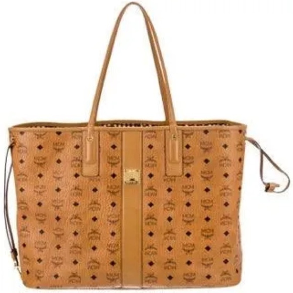 Authentic MCM Cognac Monogram Tote Bag with Gold Hardware.